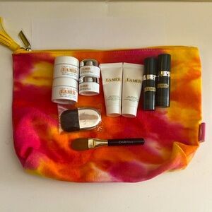 New La Mer Bundle Over 2 ounces of travel size 8 total + brushes pouch & extras